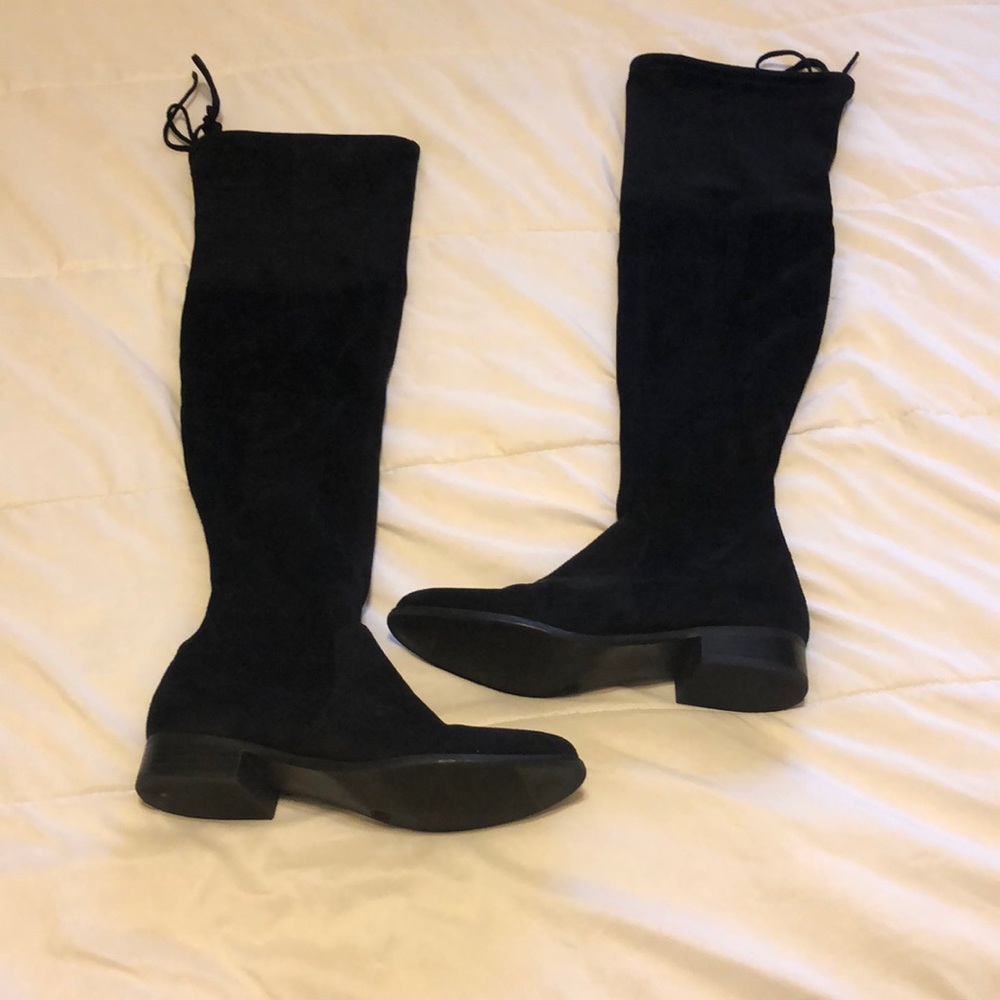 Thigh high black boots